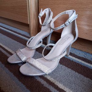 Women's gliter silver stilettos, 3 1/2 in size 8.5